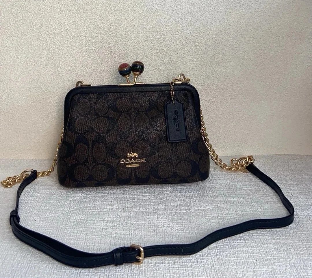 Coach Nora Kisslock Crossbody In Signature Canvas Brown Black