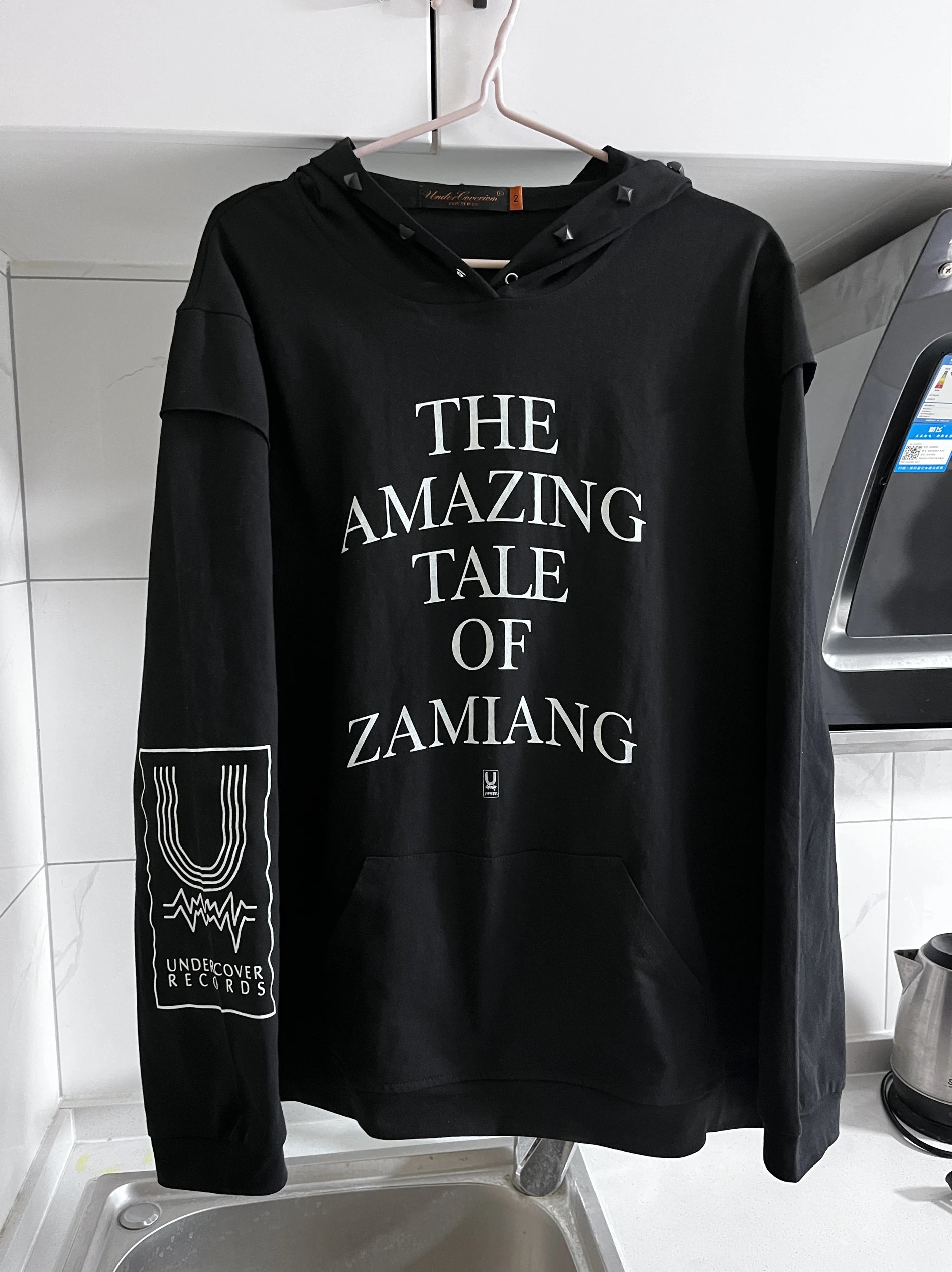Undercover SS06 "T" The Amazing Tale of Zamiang Rivet Hoodie White