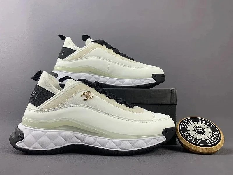 Chanel CC Embossed Suede Calfskin Sneakers Black White