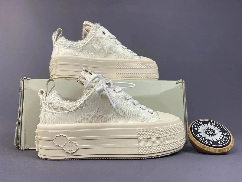 Chanel CC Embossed Suede Calfskin Sneakers Black White